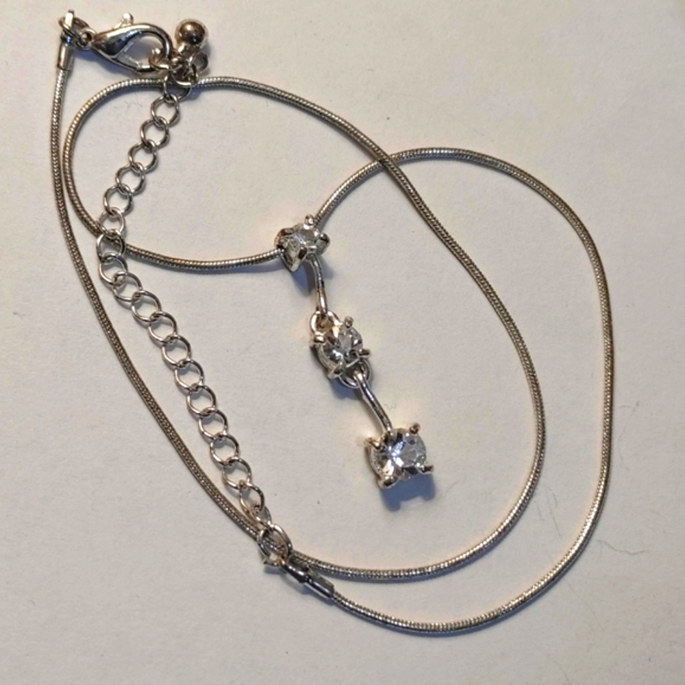 Three rhinestone journey silver necklace